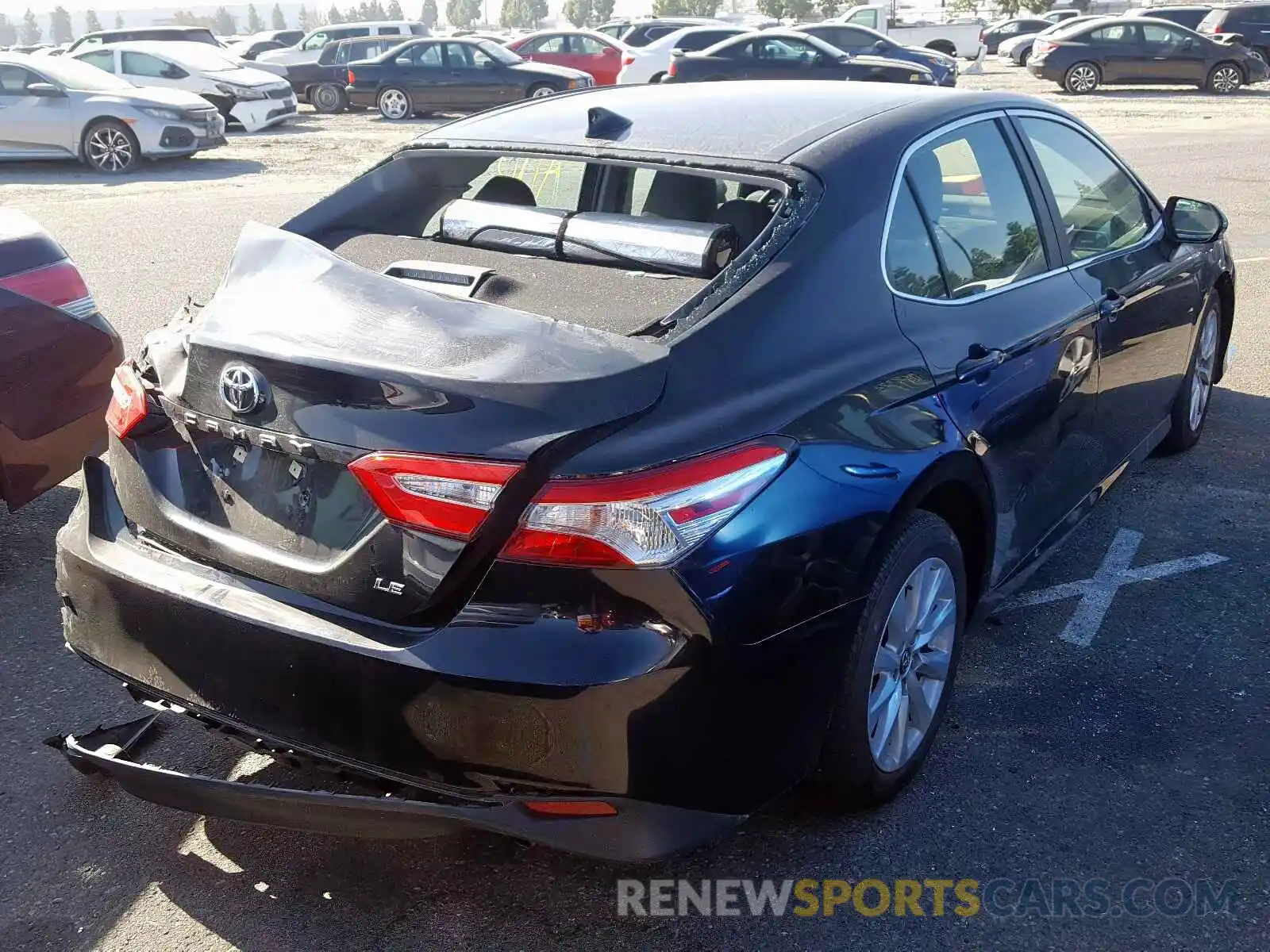 4 Photograph of a damaged car 4T1B11HKXKU167880 TOYOTA CAMRY 2019