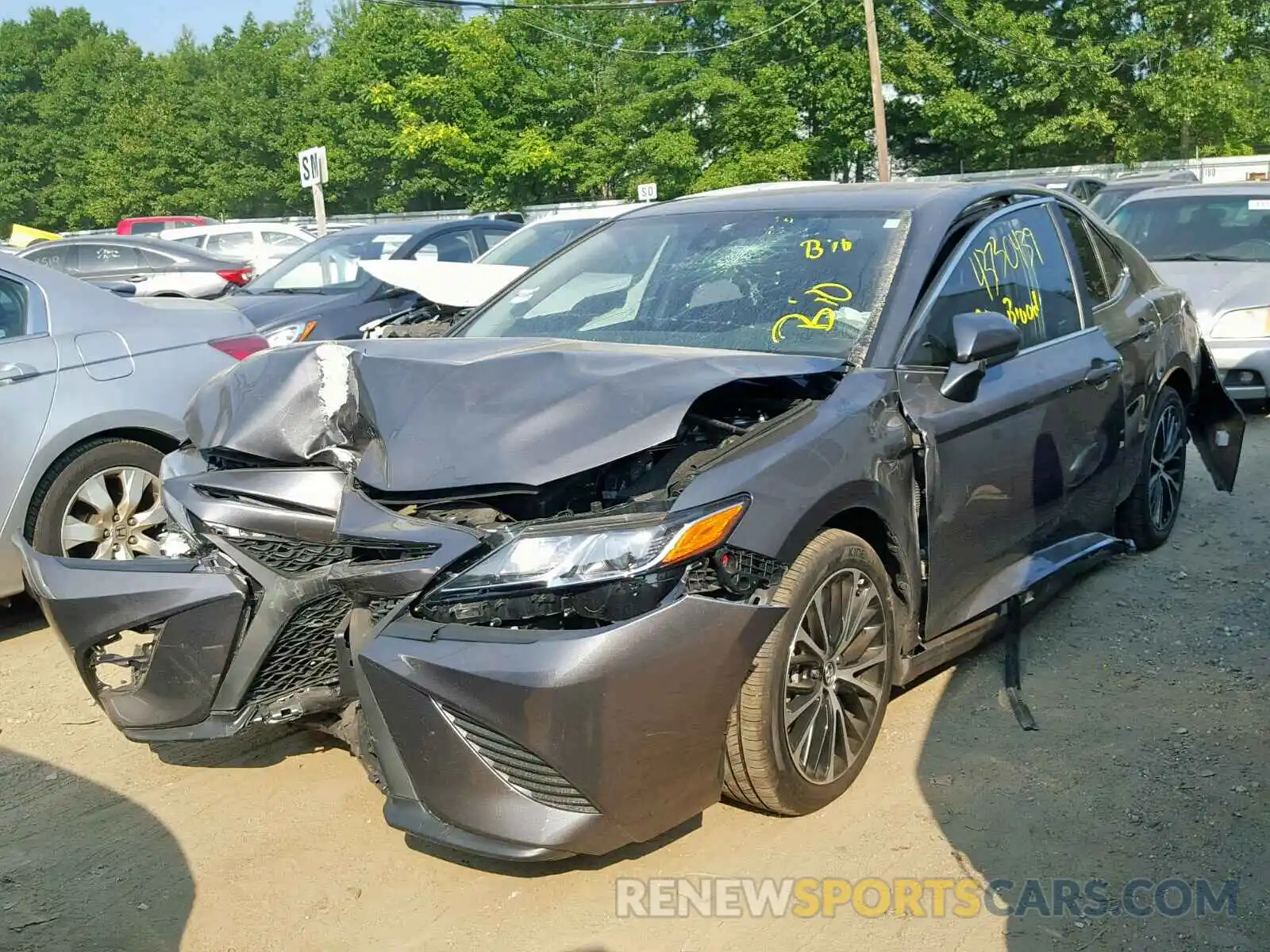 2 Photograph of a damaged car 4T1B11HKXKU173856 TOYOTA CAMRY 2019