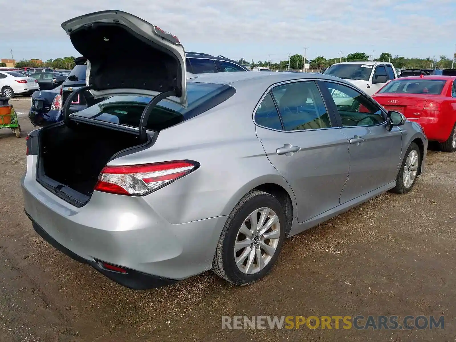 4 Photograph of a damaged car 4T1B11HKXKU176921 TOYOTA CAMRY 2019