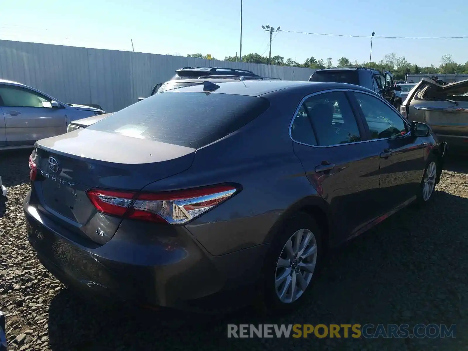 4 Photograph of a damaged car 4T1B11HKXKU180242 TOYOTA CAMRY 2019