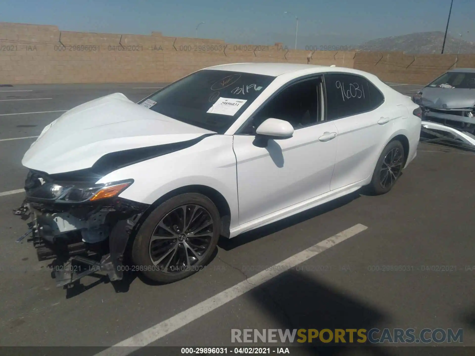 2 Photograph of a damaged car 4T1B11HKXKU180659 TOYOTA CAMRY 2019