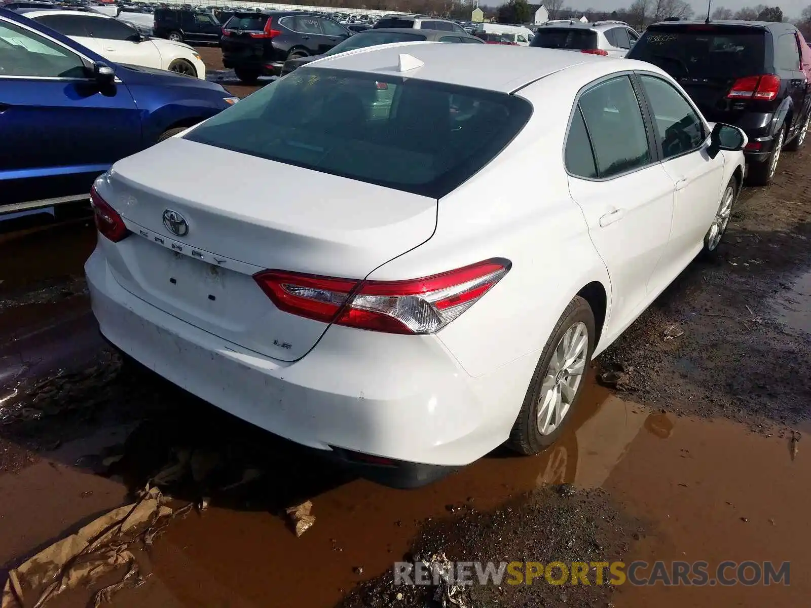 4 Photograph of a damaged car 4T1B11HKXKU181732 TOYOTA CAMRY 2019