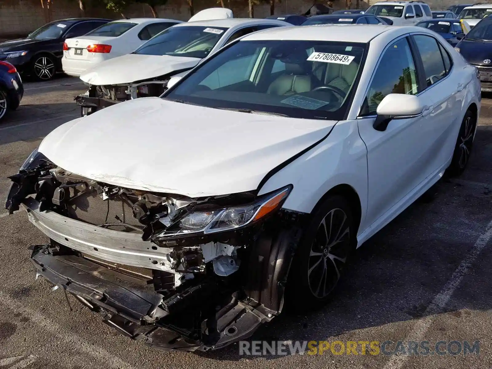 2 Photograph of a damaged car 4T1B11HKXKU184971 TOYOTA CAMRY 2019