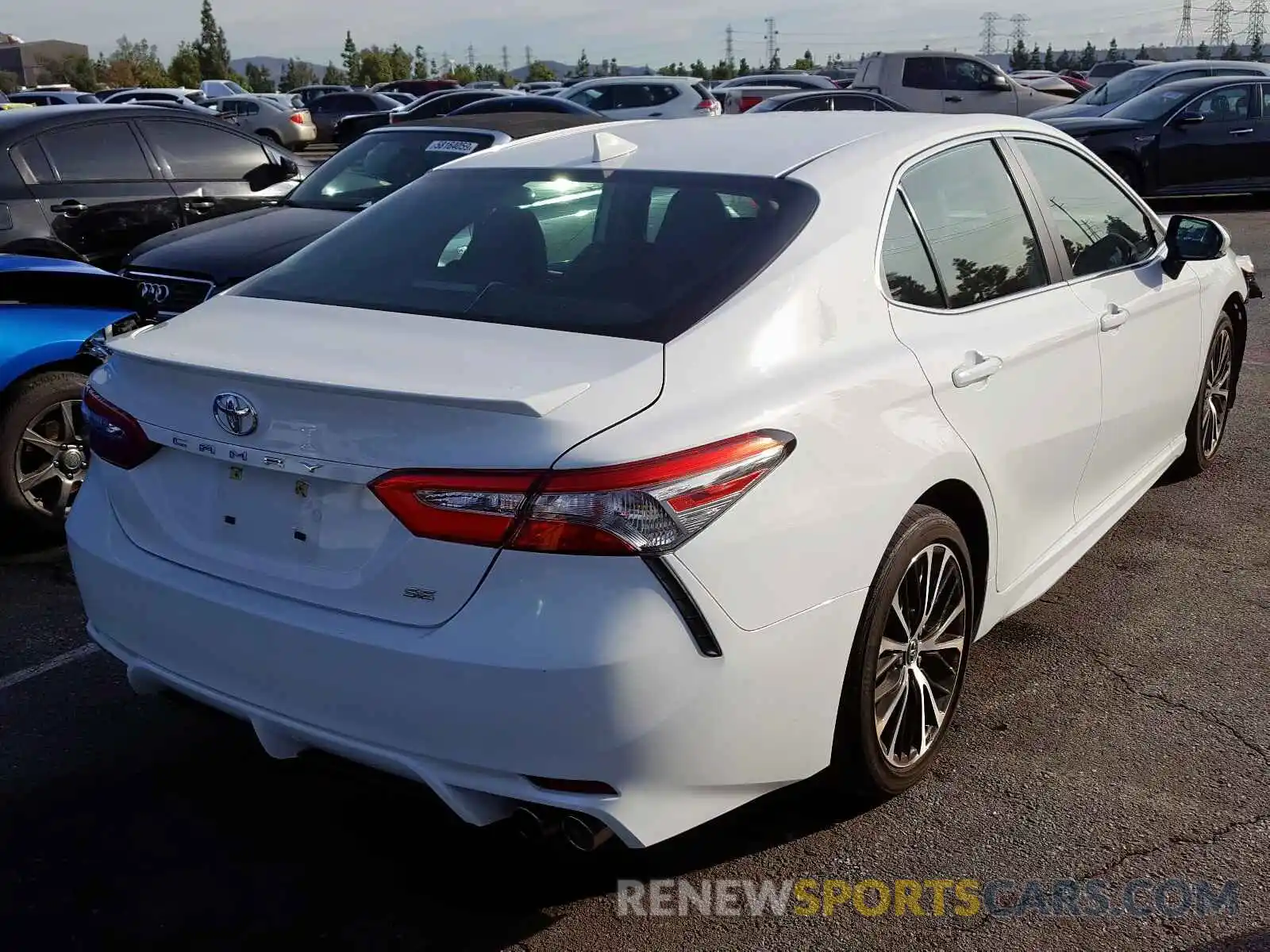 4 Photograph of a damaged car 4T1B11HKXKU184971 TOYOTA CAMRY 2019