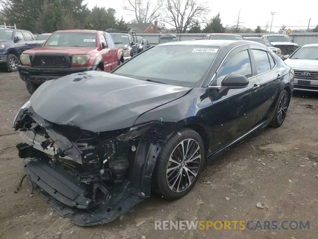 2 Photograph of a damaged car 4T1B11HKXKU189393 TOYOTA CAMRY 2019