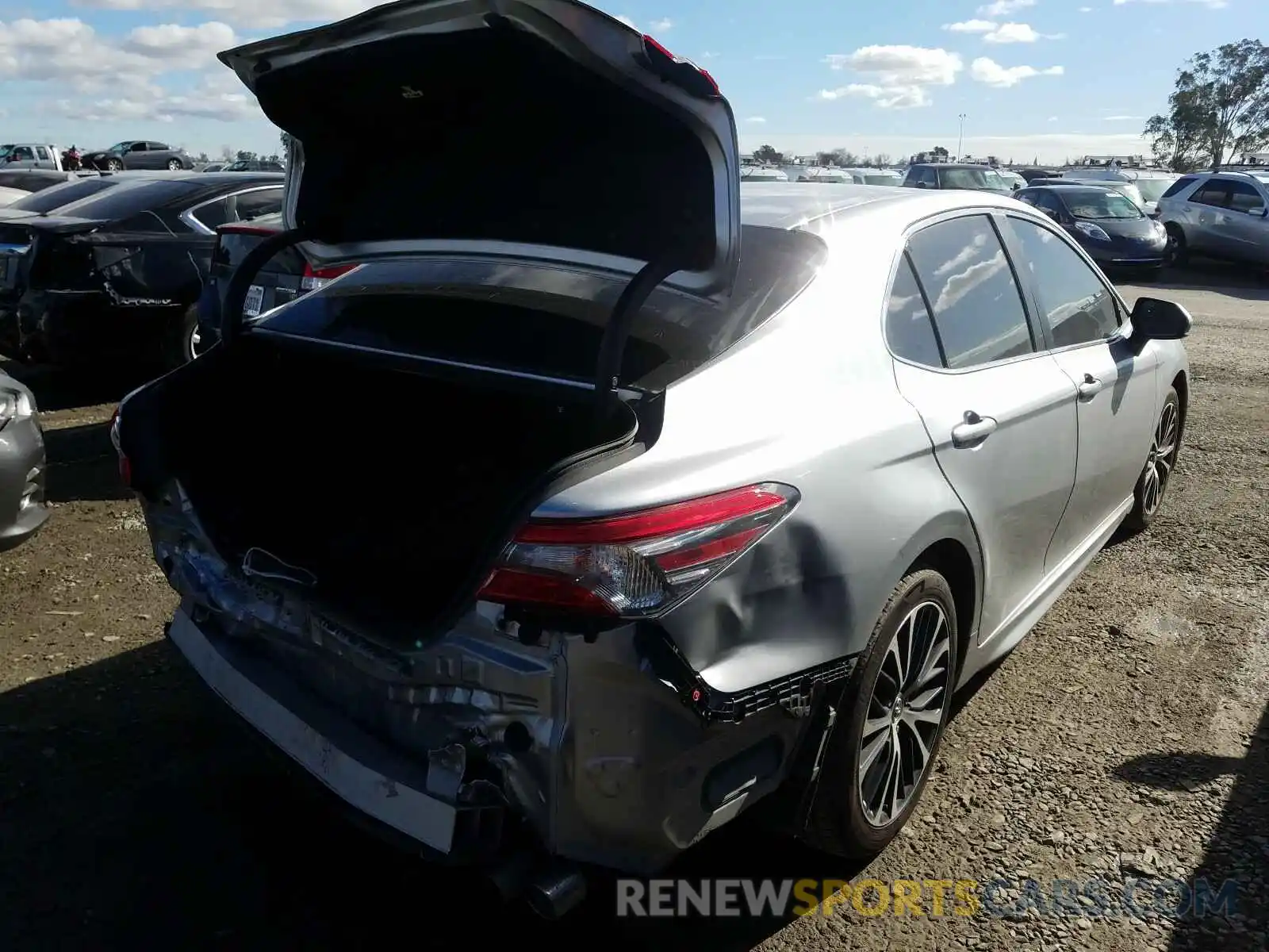 4 Photograph of a damaged car 4T1B11HKXKU189703 TOYOTA CAMRY 2019