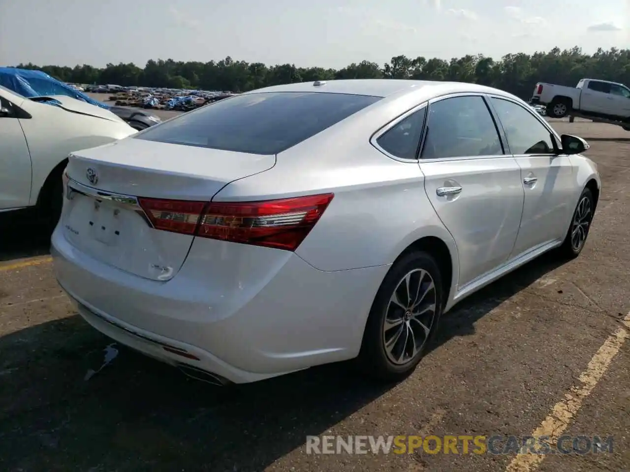 4 Photograph of a damaged car 4T1B11HKXKU190561 TOYOTA CAMRY 2019