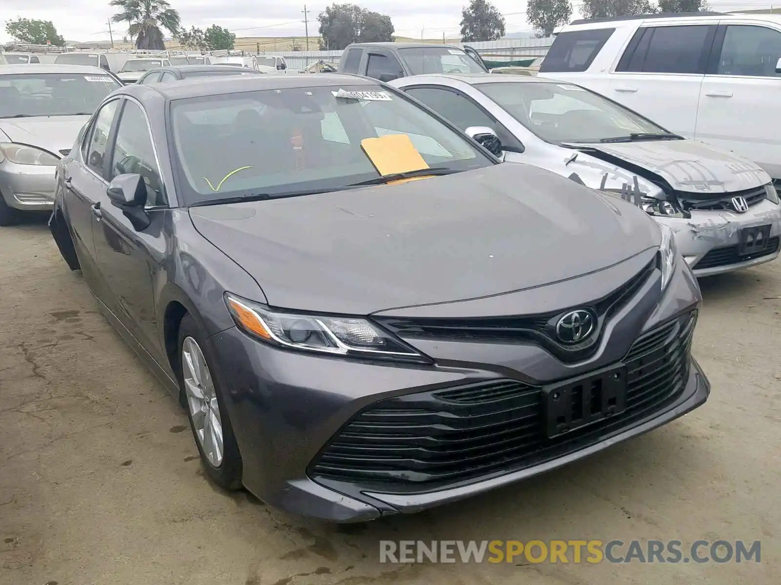 1 Photograph of a damaged car 4T1B11HKXKU193007 TOYOTA CAMRY 2019