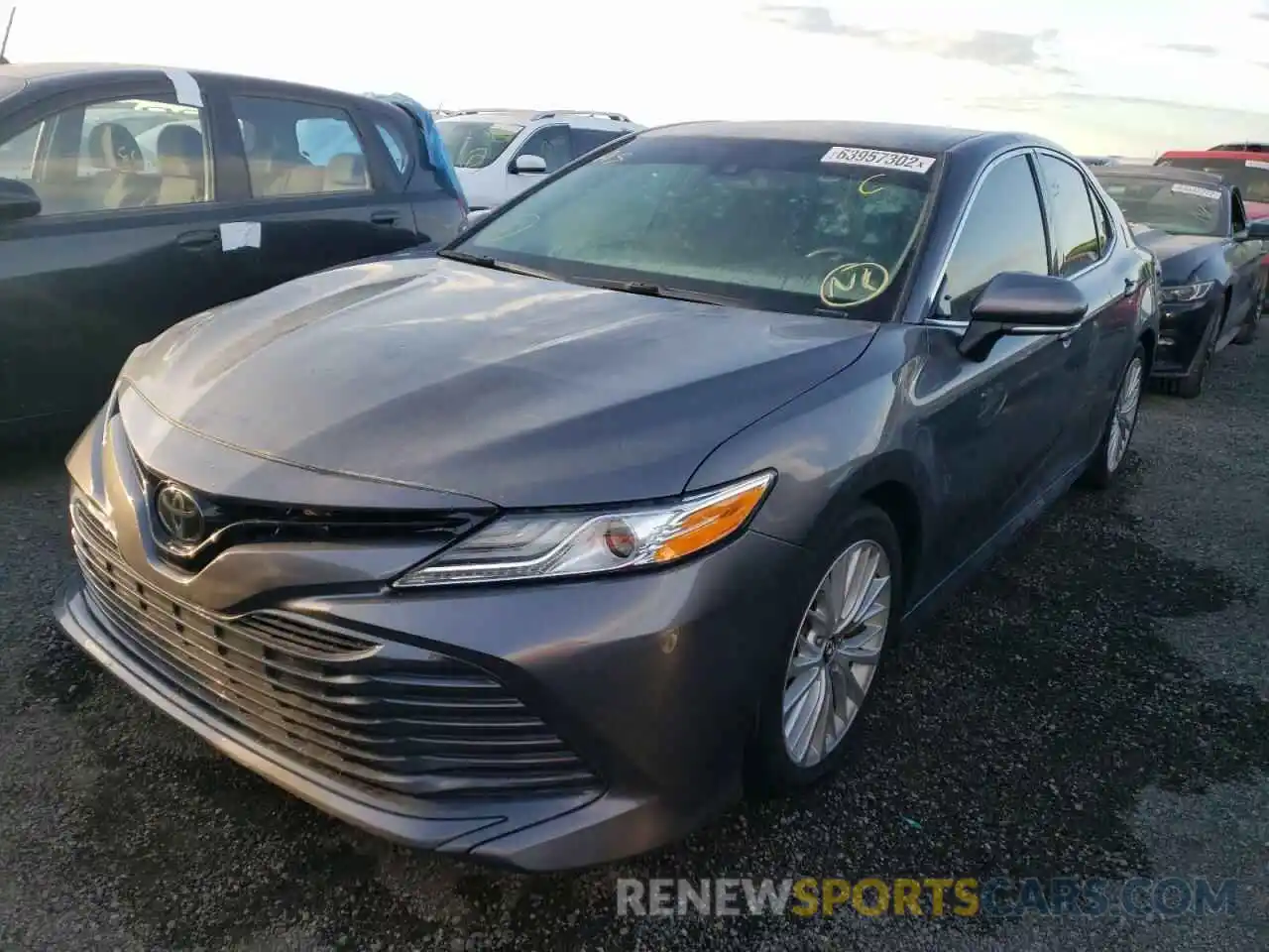 2 Photograph of a damaged car 4T1B11HKXKU193699 TOYOTA CAMRY 2019