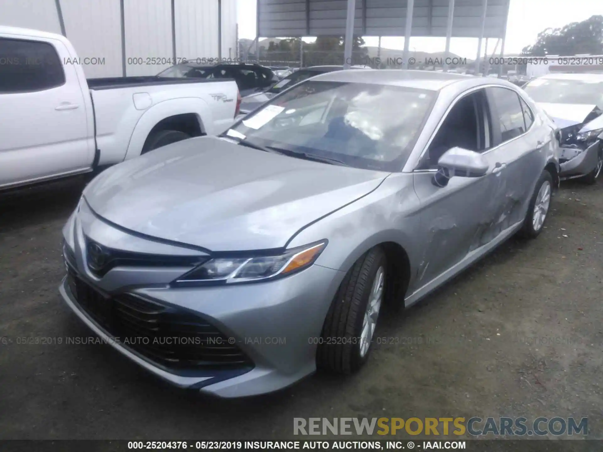 2 Photograph of a damaged car 4T1B11HKXKU197025 TOYOTA CAMRY 2019