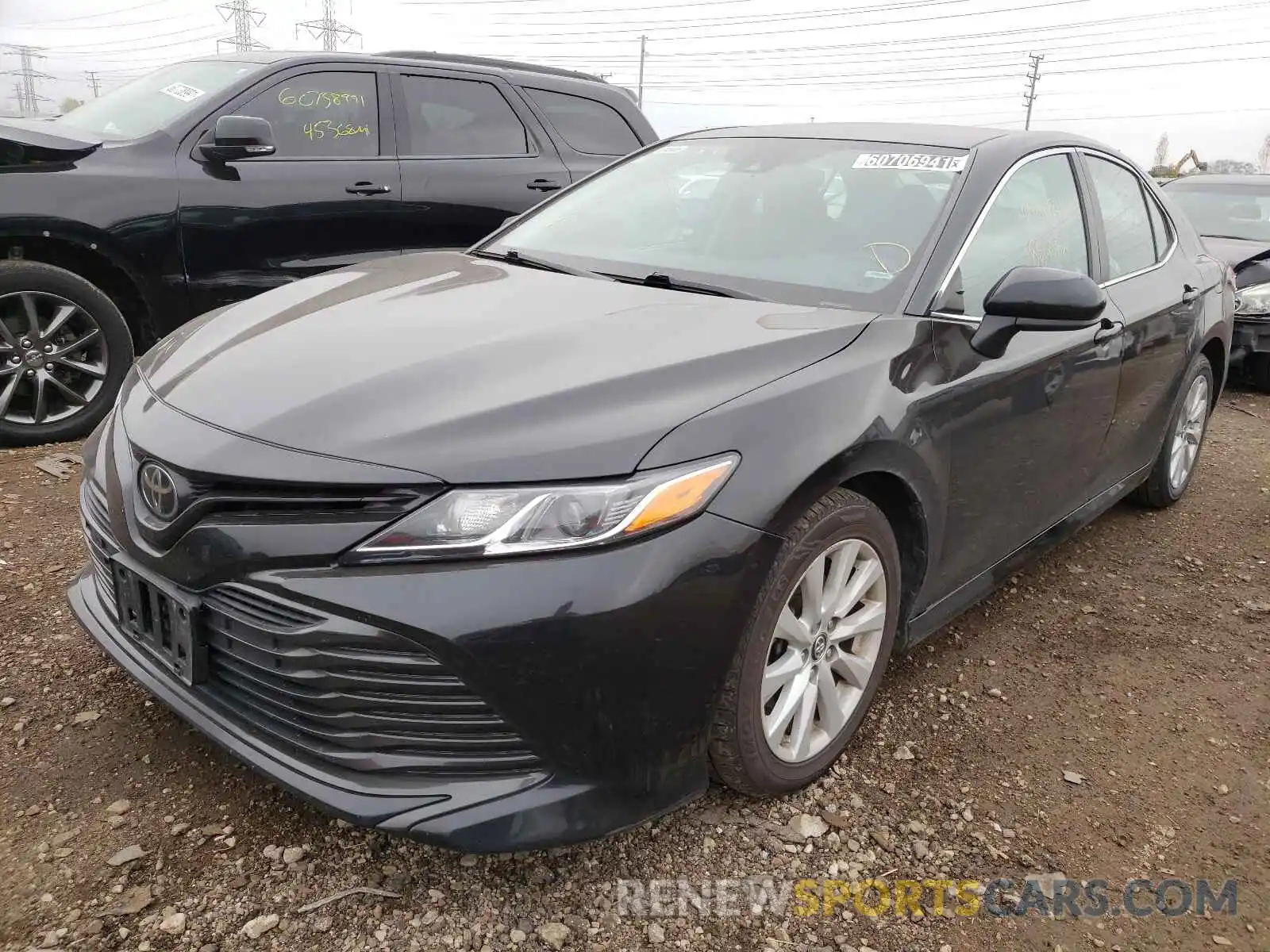 2 Photograph of a damaged car 4T1B11HKXKU198451 TOYOTA CAMRY 2019