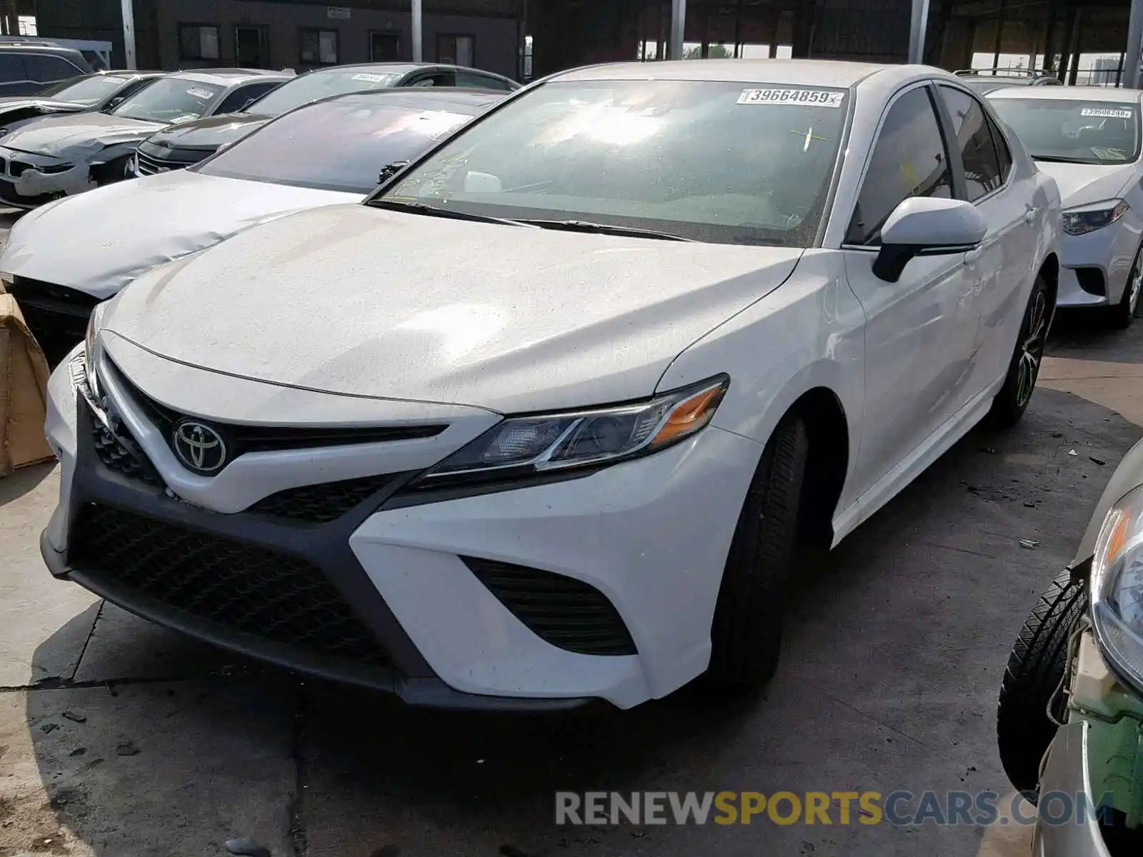 2 Photograph of a damaged car 4T1B11HKXKU200568 TOYOTA CAMRY 2019