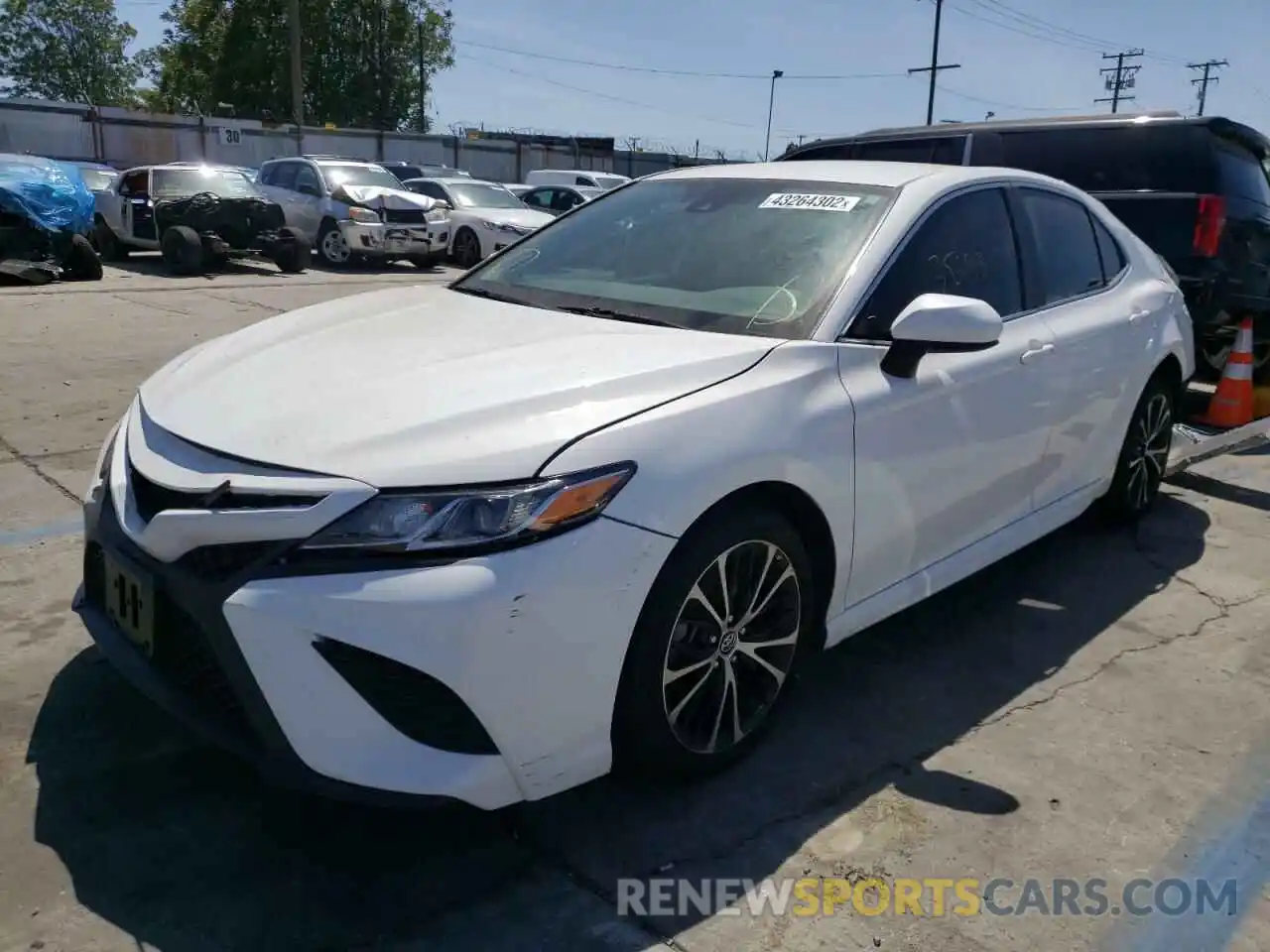 2 Photograph of a damaged car 4T1B11HKXKU203440 TOYOTA CAMRY 2019