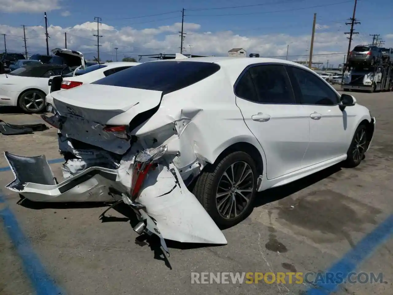 4 Photograph of a damaged car 4T1B11HKXKU203440 TOYOTA CAMRY 2019