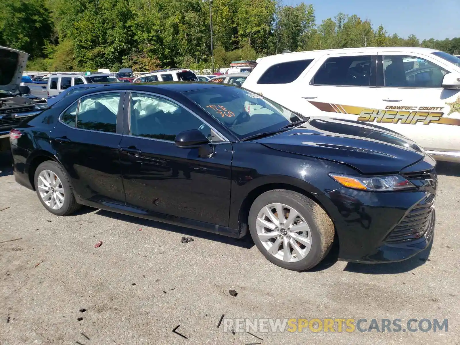 1 Photograph of a damaged car 4T1B11HKXKU207309 TOYOTA CAMRY 2019