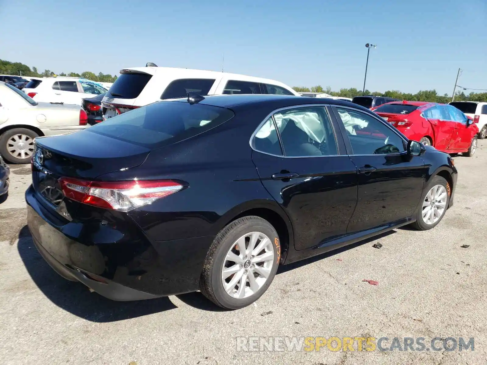 4 Photograph of a damaged car 4T1B11HKXKU207309 TOYOTA CAMRY 2019