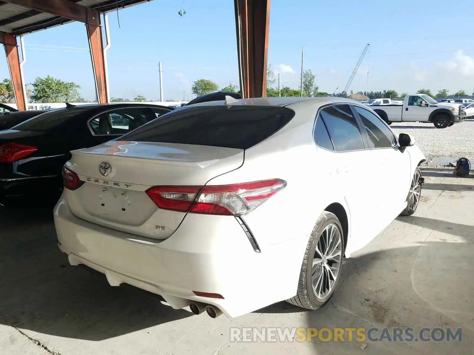 4 Photograph of a damaged car 4T1B11HKXKU209500 TOYOTA CAMRY 2019