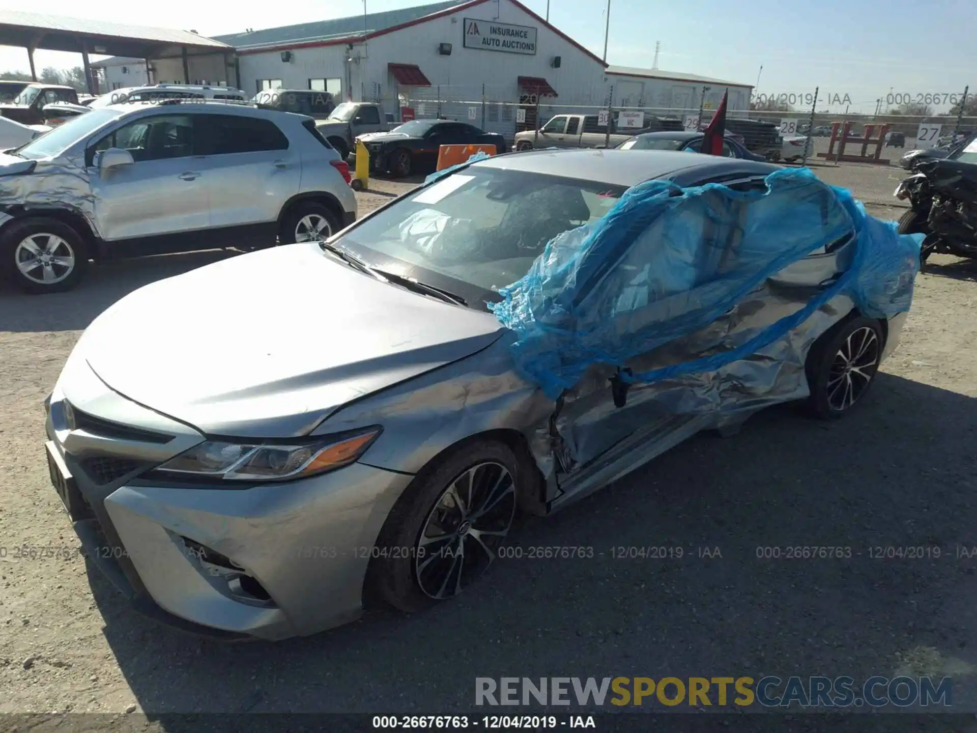 2 Photograph of a damaged car 4T1B11HKXKU209951 TOYOTA CAMRY 2019