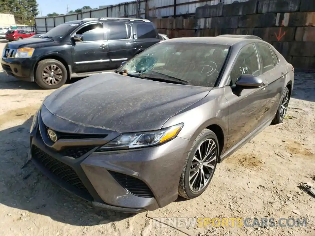 2 Photograph of a damaged car 4T1B11HKXKU213403 TOYOTA CAMRY 2019