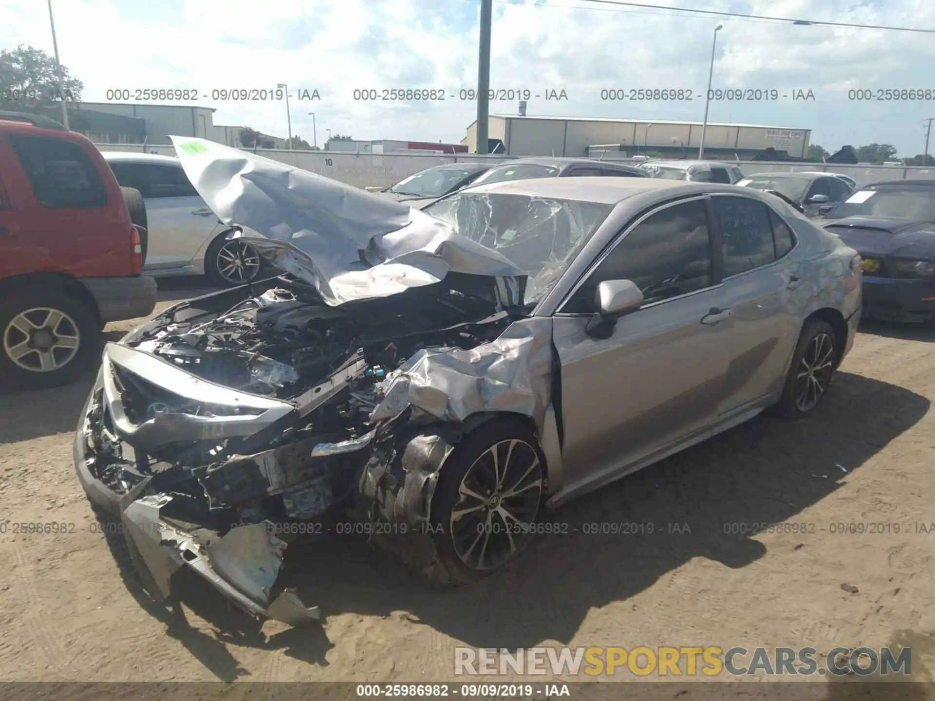 2 Photograph of a damaged car 4T1B11HKXKU214177 TOYOTA CAMRY 2019