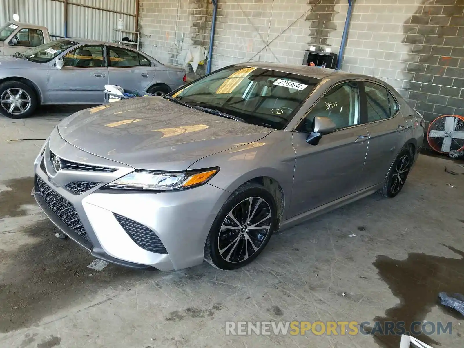 2 Photograph of a damaged car 4T1B11HKXKU216348 TOYOTA CAMRY 2019