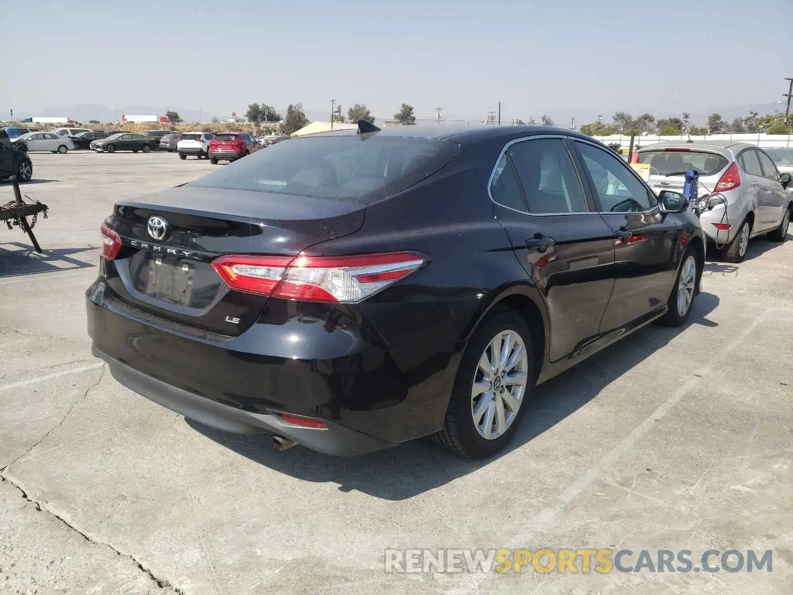 4 Photograph of a damaged car 4T1B11HKXKU217225 TOYOTA CAMRY 2019