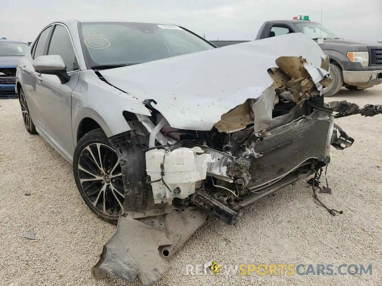 1 Photograph of a damaged car 4T1B11HKXKU219332 TOYOTA CAMRY 2019