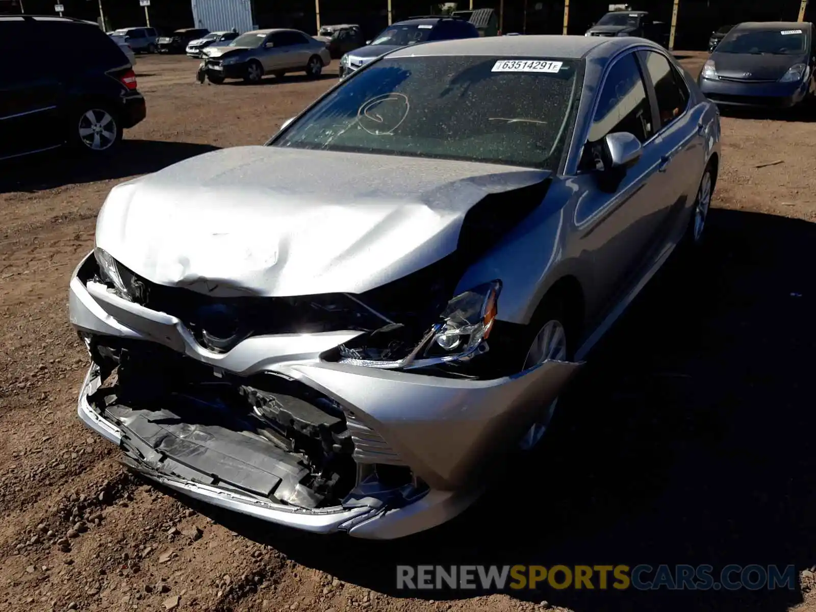 2 Photograph of a damaged car 4T1B11HKXKU220917 TOYOTA CAMRY 2019