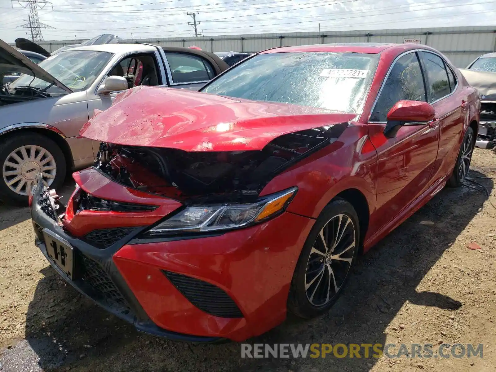 2 Photograph of a damaged car 4T1B11HKXKU228693 TOYOTA CAMRY 2019