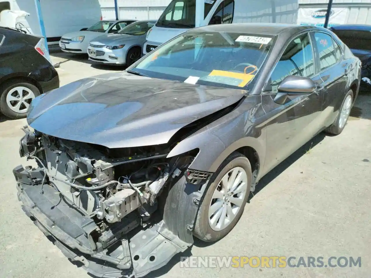 2 Photograph of a damaged car 4T1B11HKXKU230556 TOYOTA CAMRY 2019