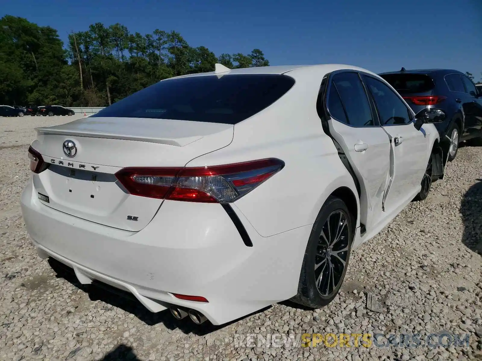 4 Photograph of a damaged car 4T1B11HKXKU230654 TOYOTA CAMRY 2019