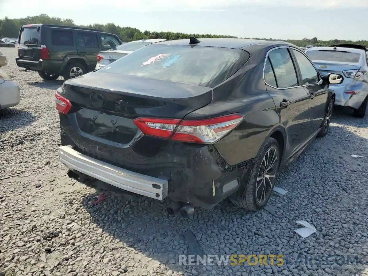 4 Photograph of a damaged car 4T1B11HKXKU230881 TOYOTA CAMRY 2019