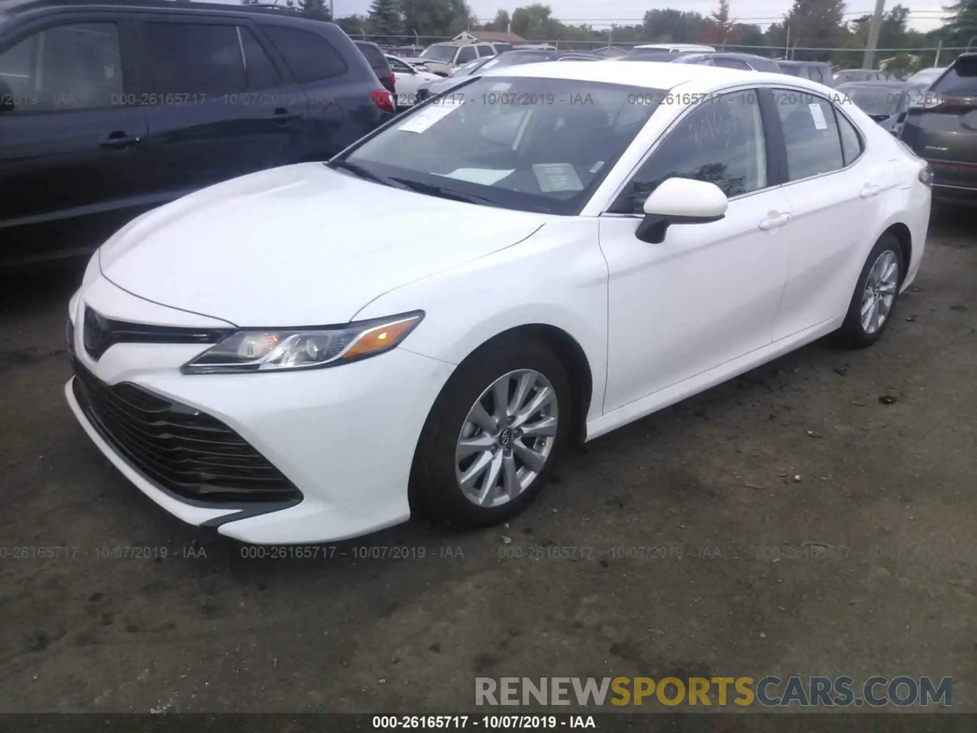 2 Photograph of a damaged car 4T1B11HKXKU232257 TOYOTA CAMRY 2019