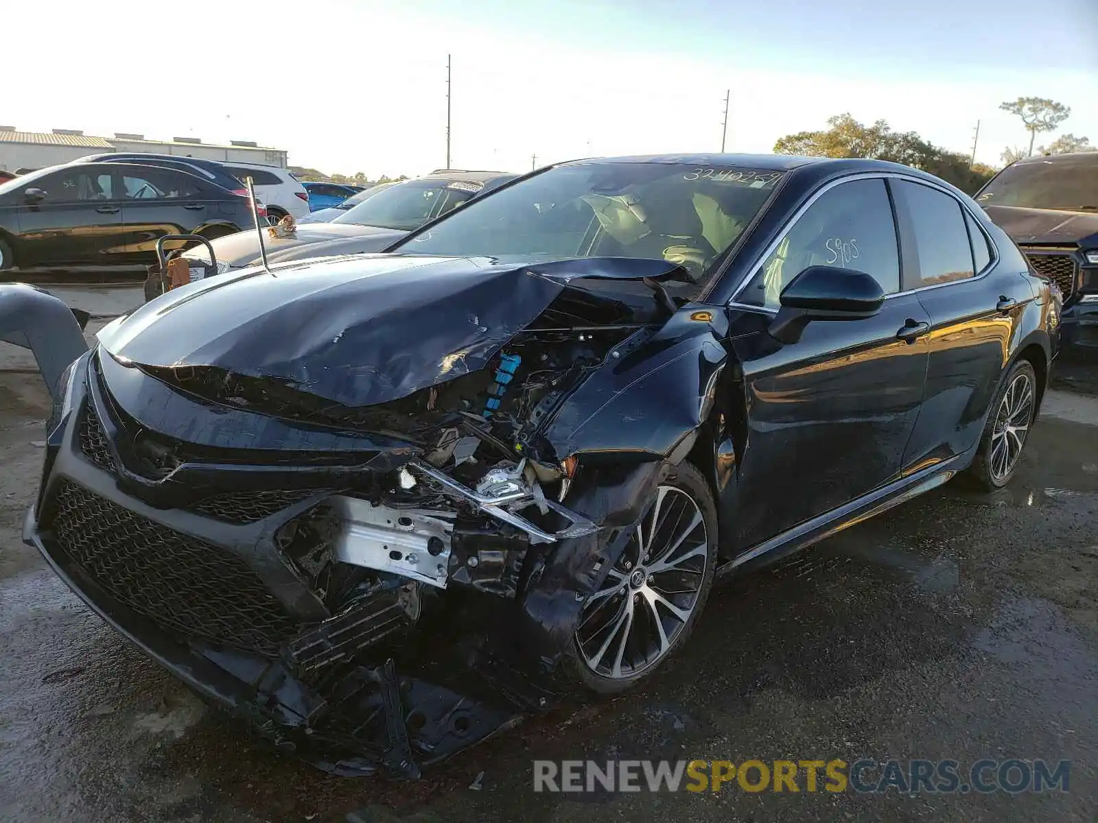 2 Photograph of a damaged car 4T1B11HKXKU235806 TOYOTA CAMRY 2019