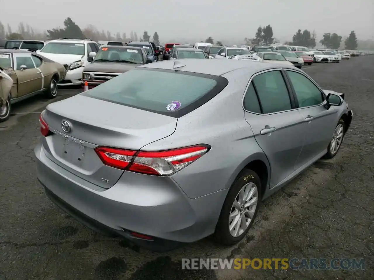 4 Photograph of a damaged car 4T1B11HKXKU236003 TOYOTA CAMRY 2019