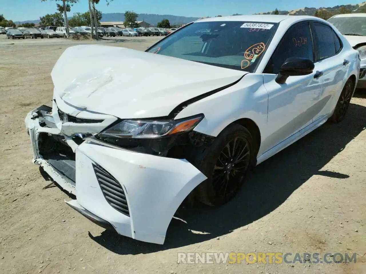 2 Photograph of a damaged car 4T1B11HKXKU237300 TOYOTA CAMRY 2019