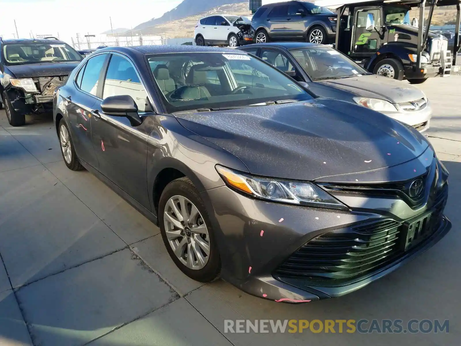 1 Photograph of a damaged car 4T1B11HKXKU238995 TOYOTA CAMRY 2019