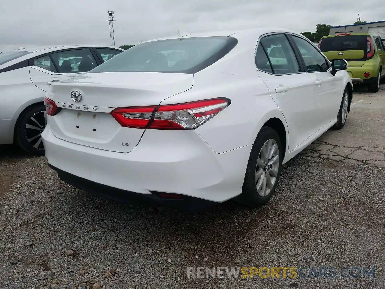 4 Photograph of a damaged car 4T1B11HKXKU240391 TOYOTA CAMRY 2019