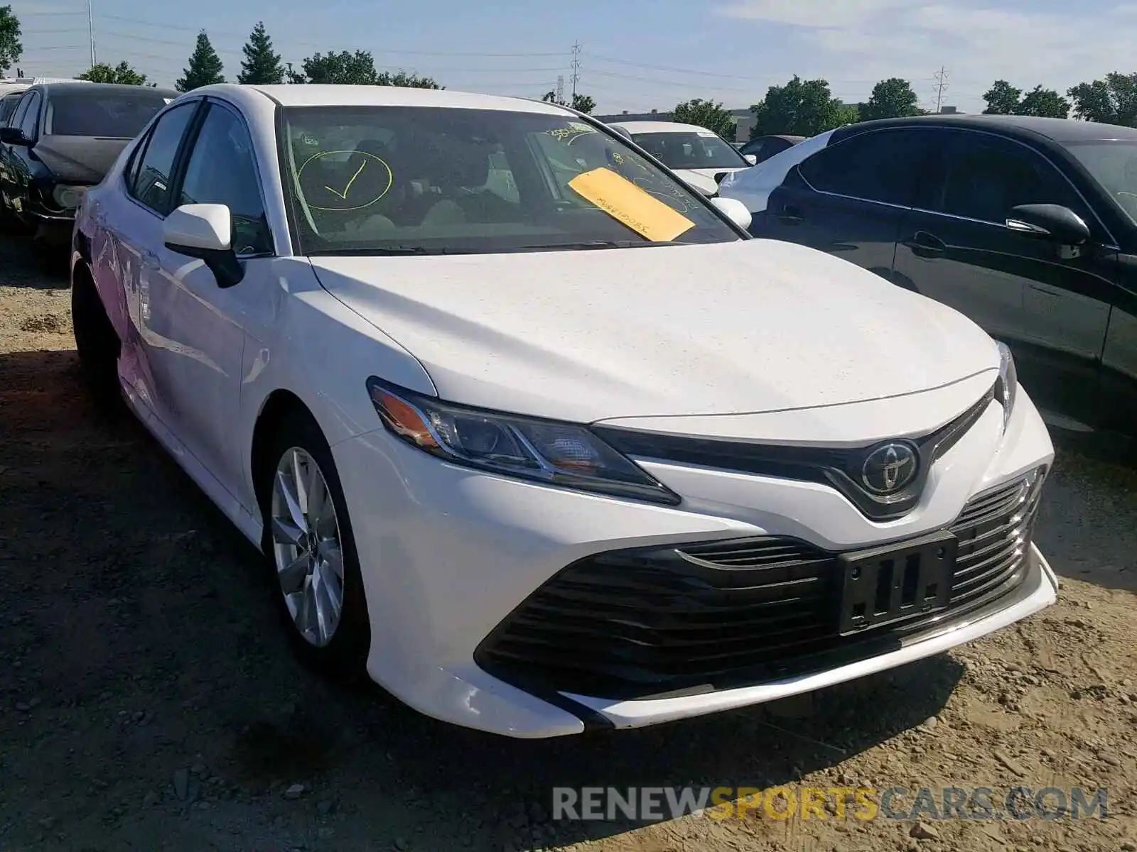 1 Photograph of a damaged car 4T1B11HKXKU243176 TOYOTA CAMRY 2019