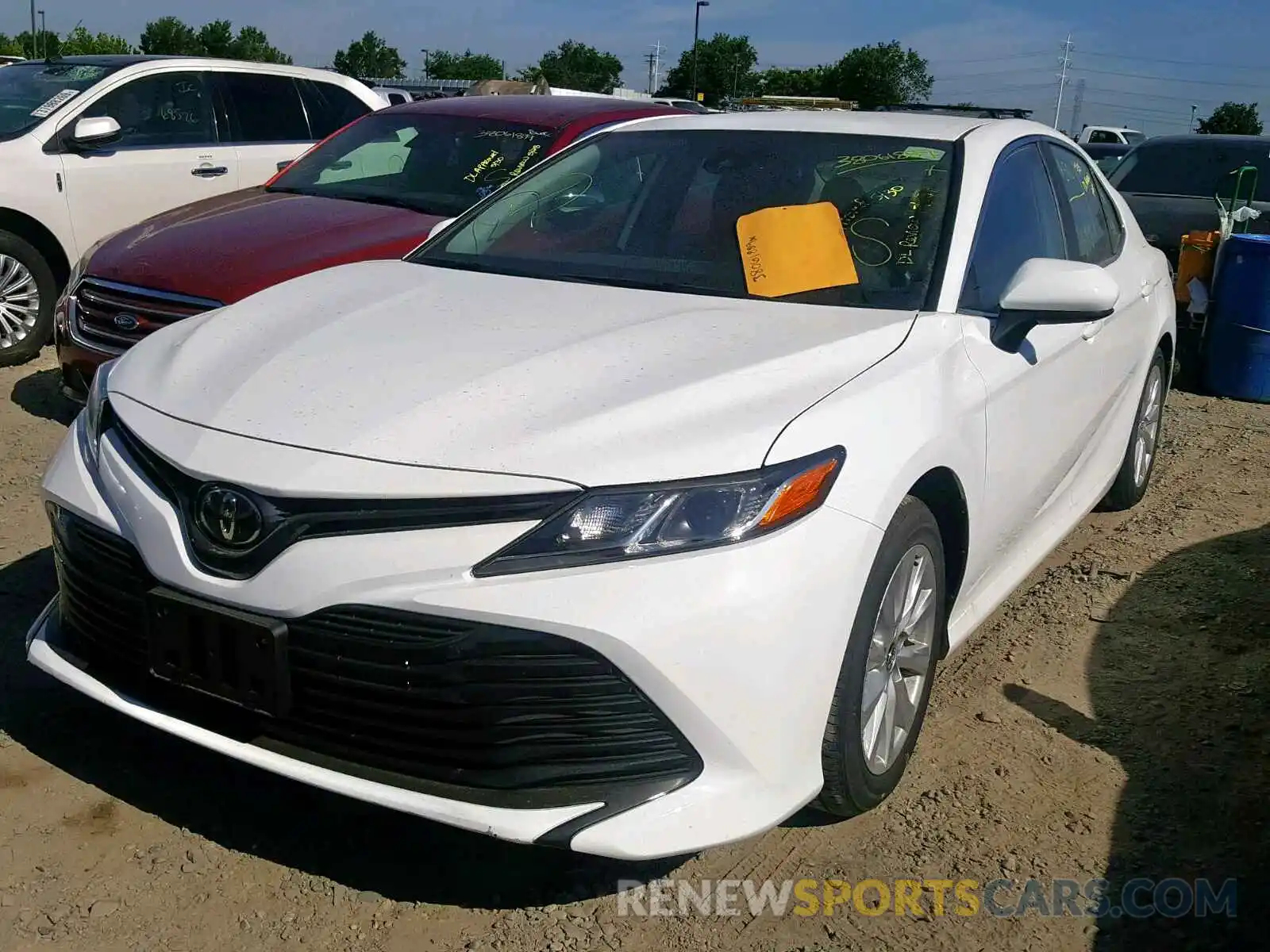 2 Photograph of a damaged car 4T1B11HKXKU243176 TOYOTA CAMRY 2019