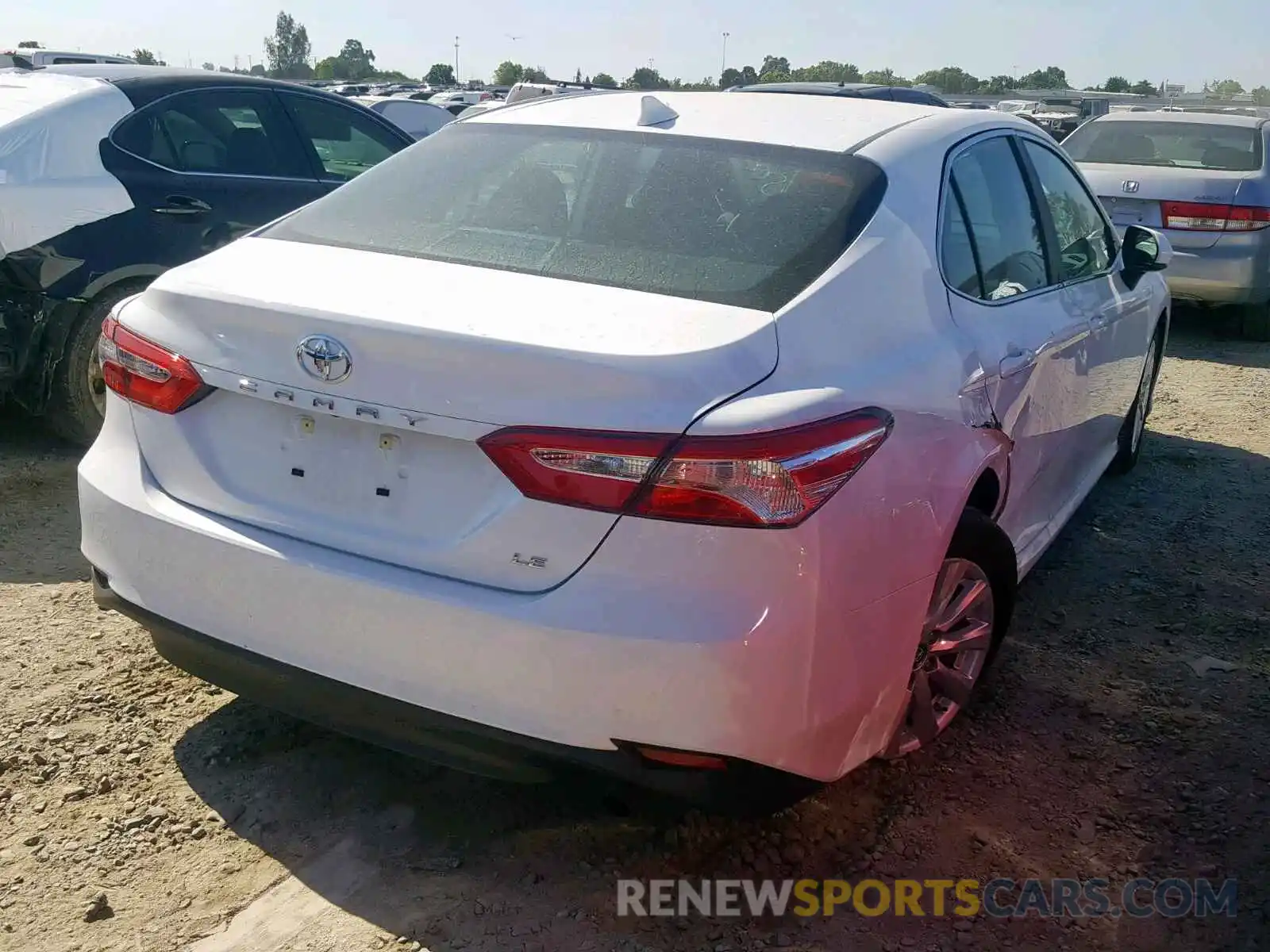 4 Photograph of a damaged car 4T1B11HKXKU243176 TOYOTA CAMRY 2019