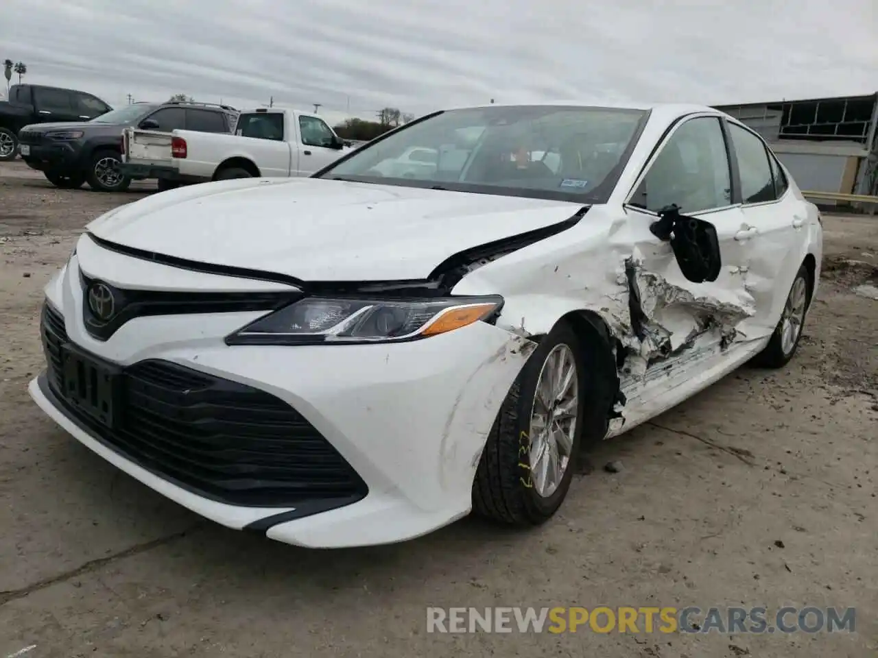 2 Photograph of a damaged car 4T1B11HKXKU243937 TOYOTA CAMRY 2019