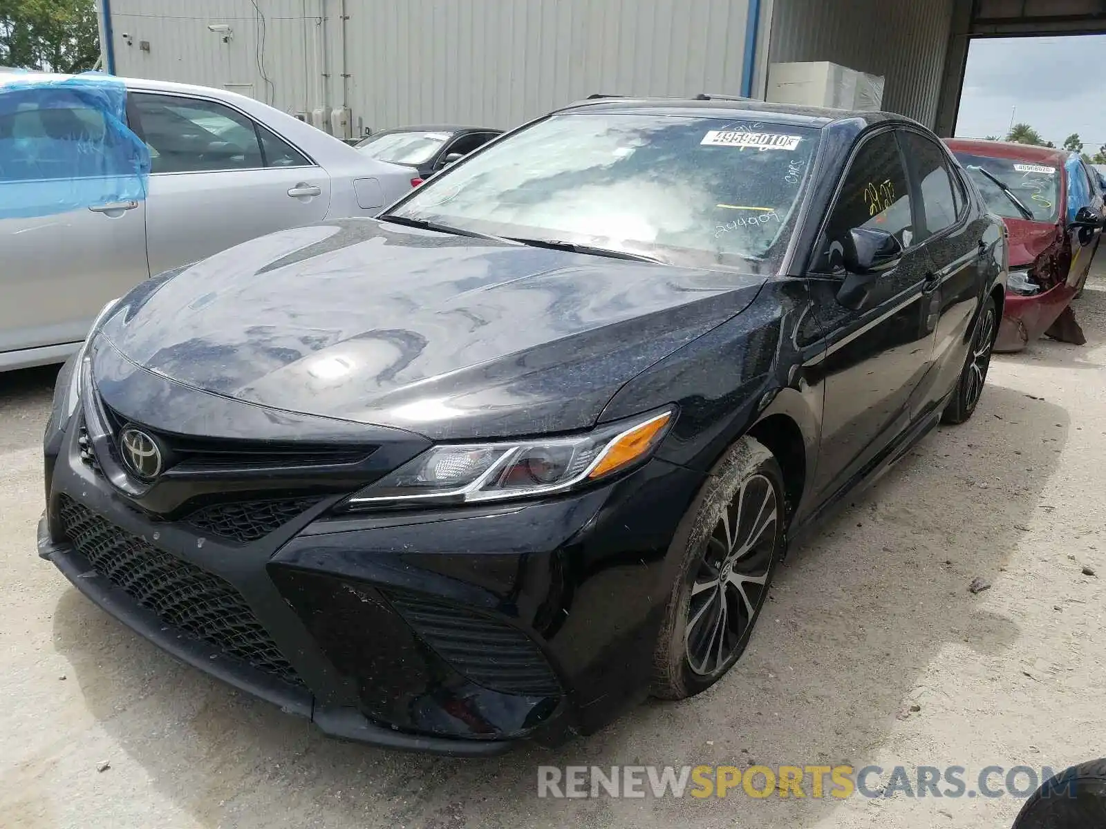 2 Photograph of a damaged car 4T1B11HKXKU244909 TOYOTA CAMRY 2019