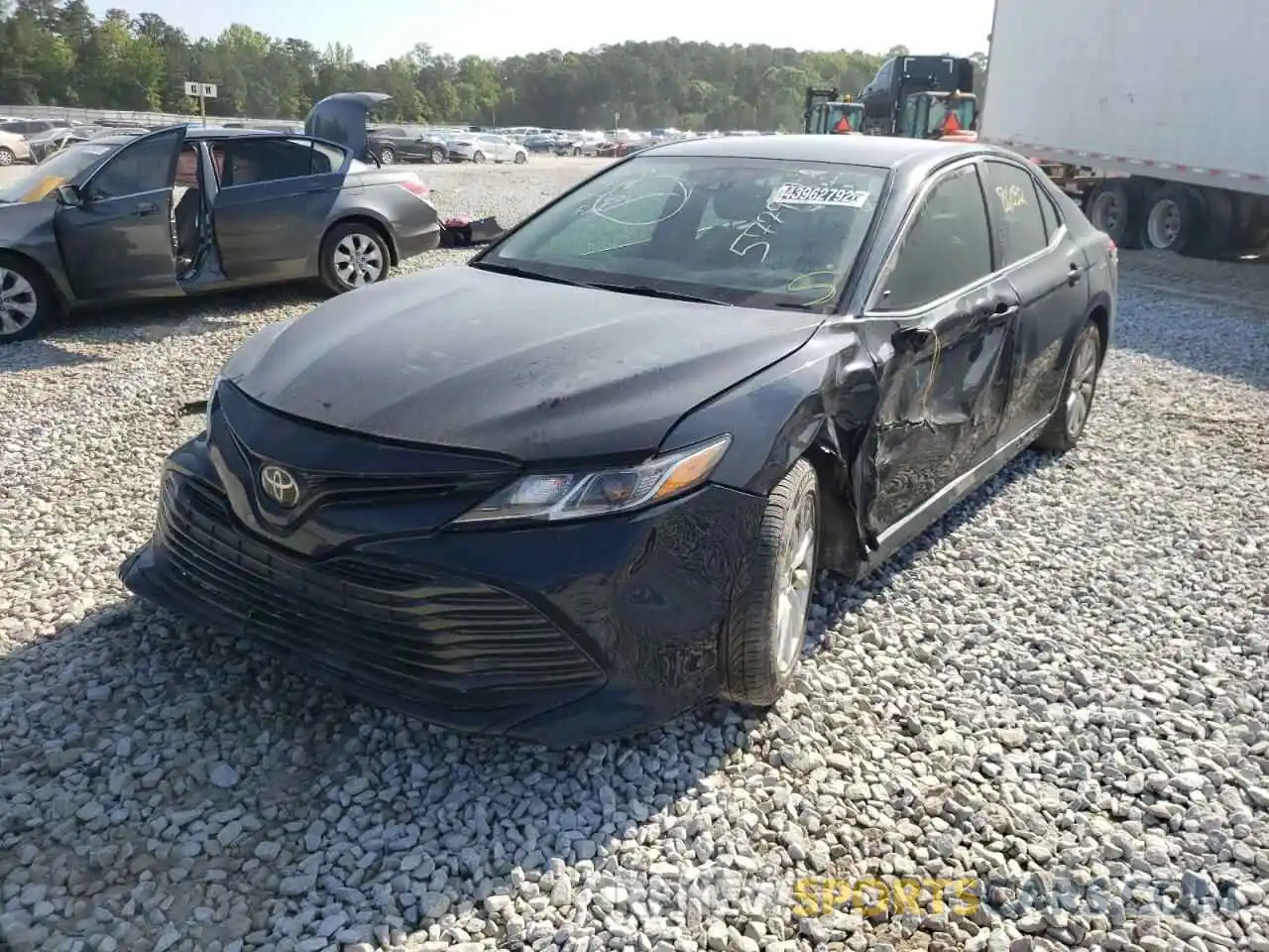 2 Photograph of a damaged car 4T1B11HKXKU246630 TOYOTA CAMRY 2019