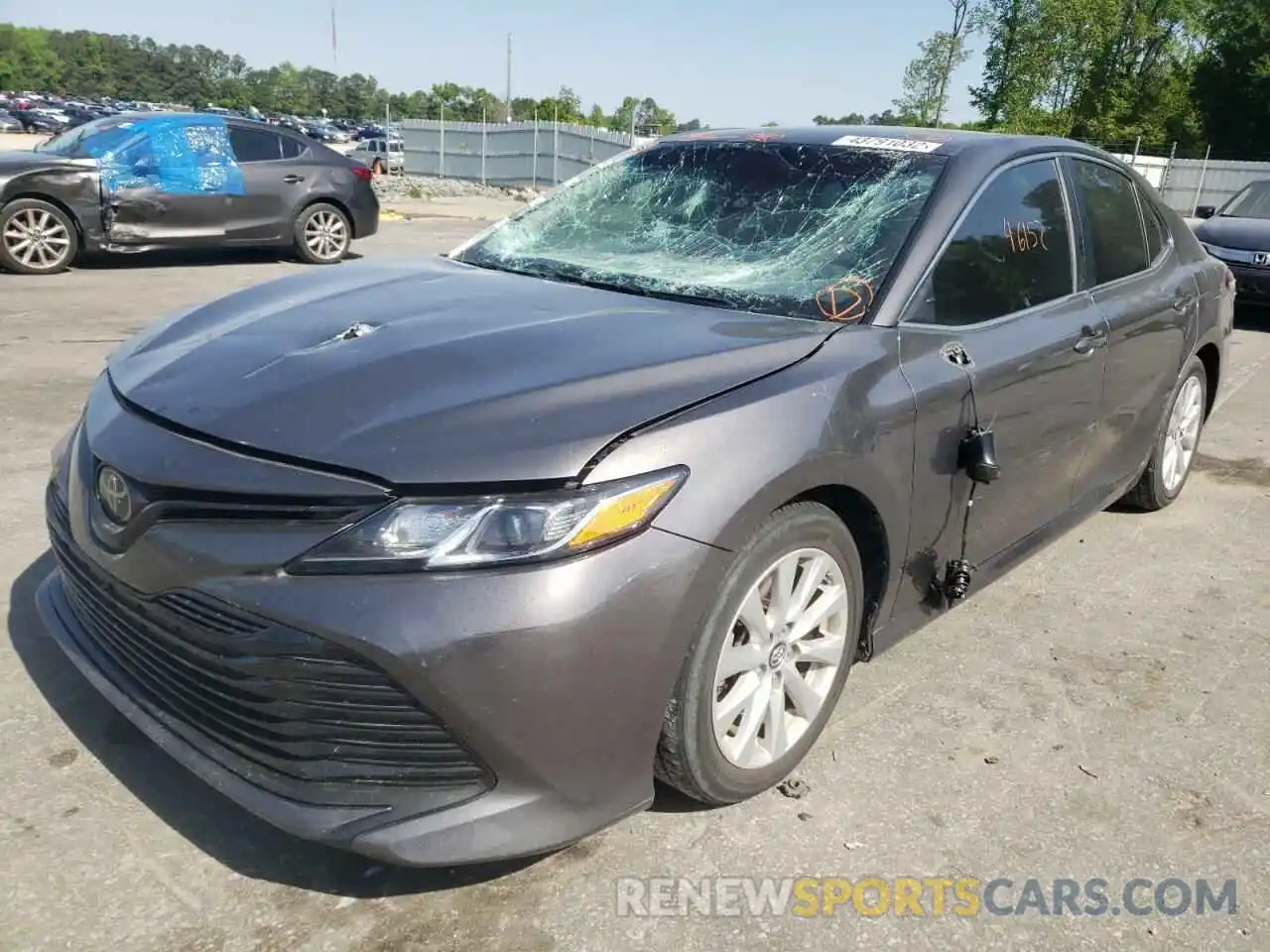 2 Photograph of a damaged car 4T1B11HKXKU247759 TOYOTA CAMRY 2019