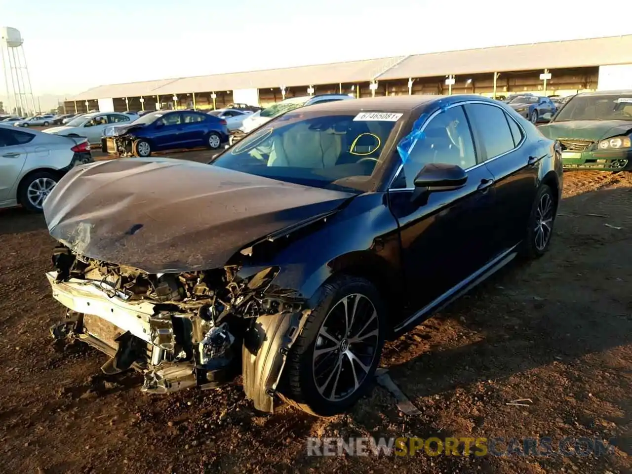 2 Photograph of a damaged car 4T1B11HKXKU251195 TOYOTA CAMRY 2019