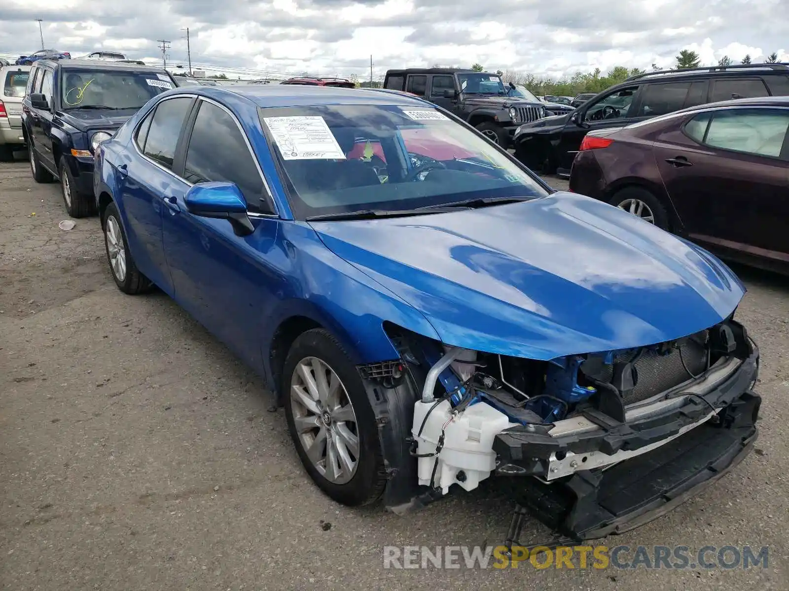 1 Photograph of a damaged car 4T1B11HKXKU255554 TOYOTA CAMRY 2019