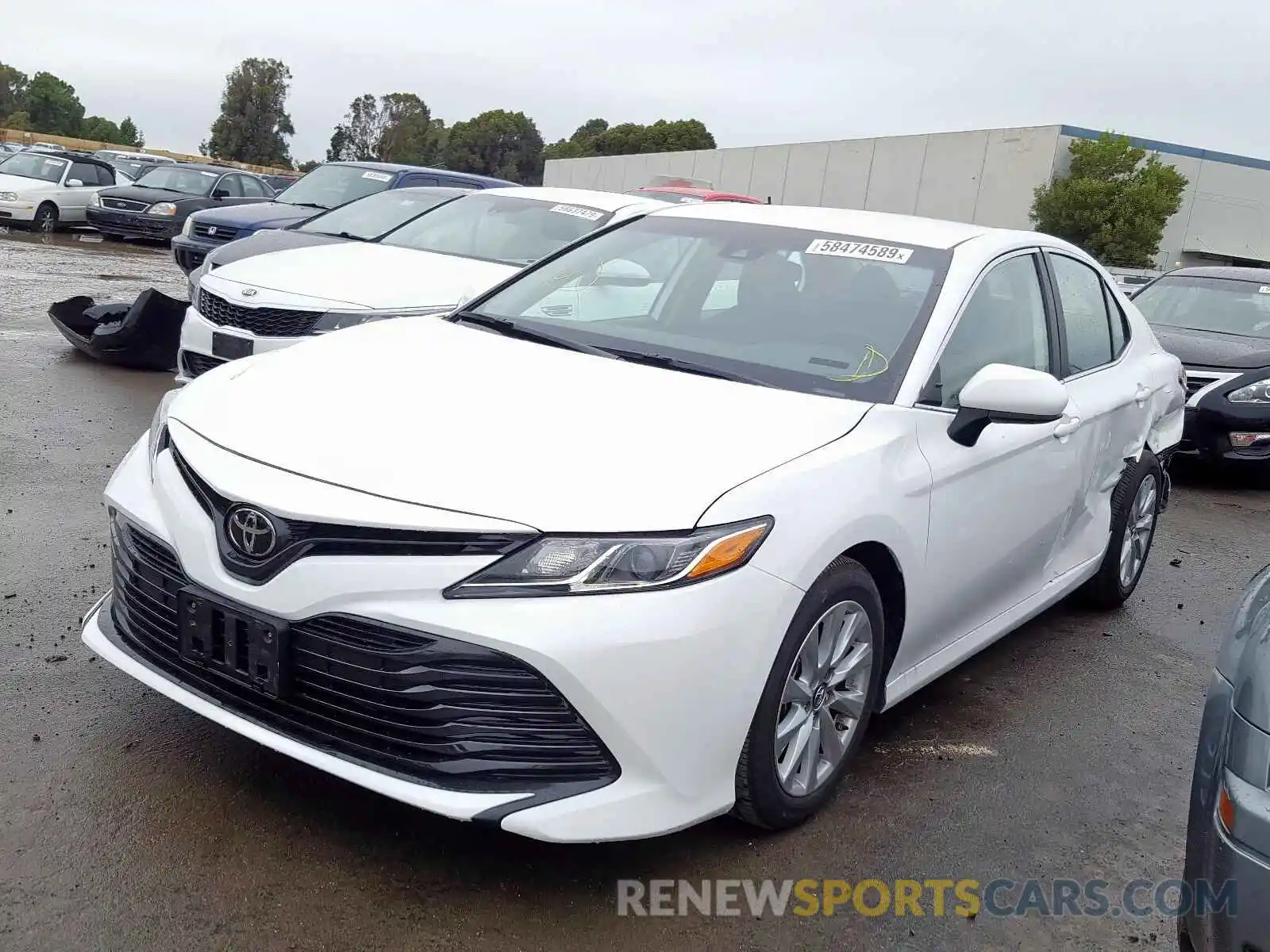 2 Photograph of a damaged car 4T1B11HKXKU255845 TOYOTA CAMRY 2019