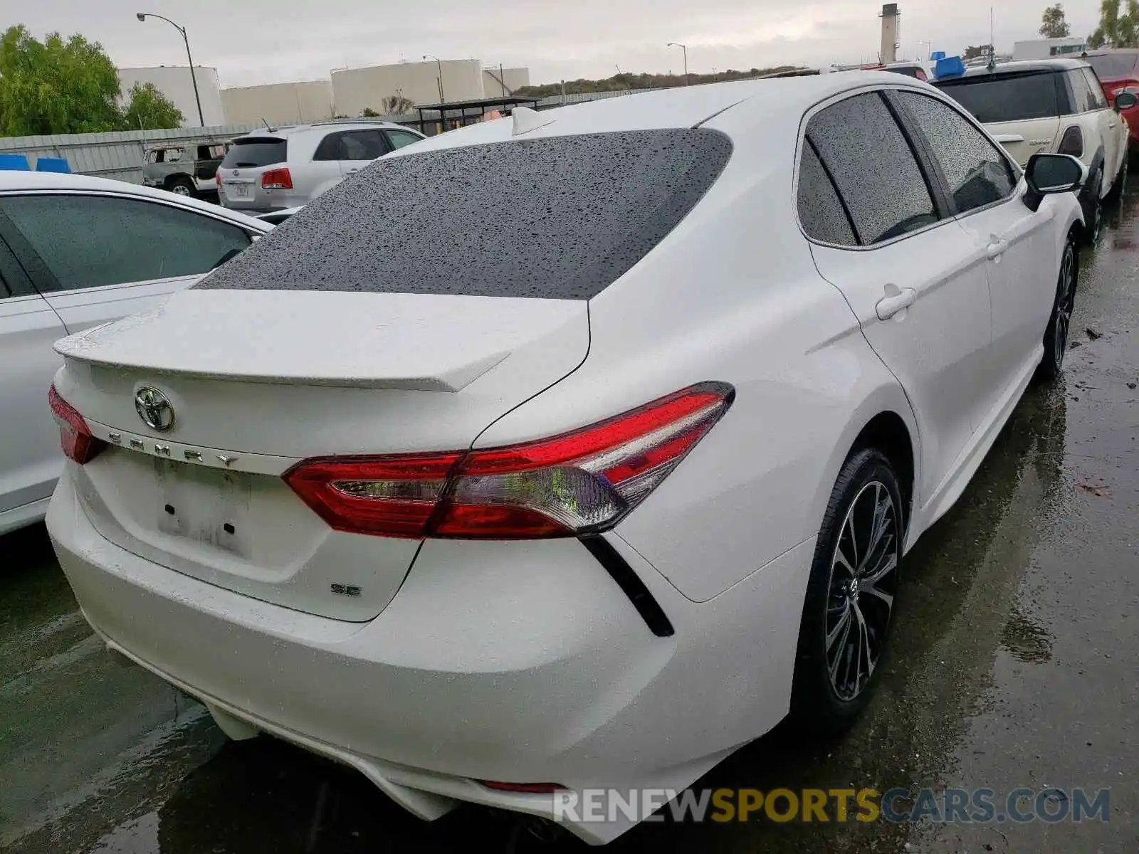 4 Photograph of a damaged car 4T1B11HKXKU256879 TOYOTA CAMRY 2019