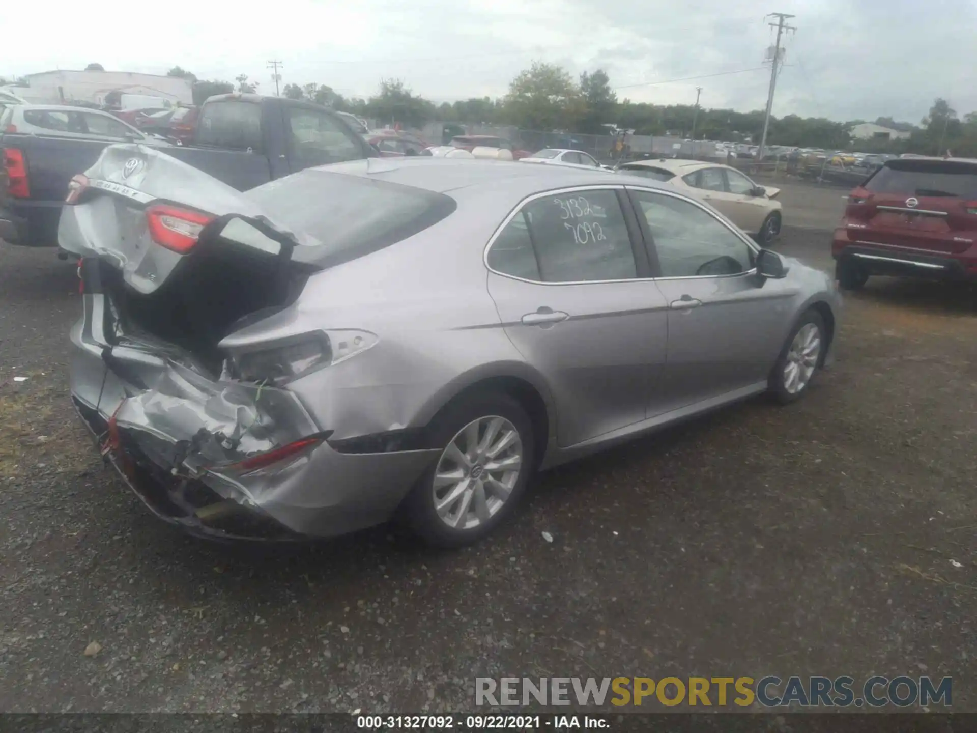 4 Photograph of a damaged car 4T1B11HKXKU261872 TOYOTA CAMRY 2019